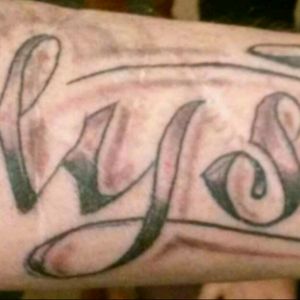 Free hand writing I do. (Alyse). Customer had a lot of scares on arm. It looks really nice. Very clean line's, and good contrast.