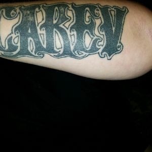My L outter forearm it says CAREV it's my last name by marriage. My husband designed it . It was done by my son in law as a birthday gift . Needs touched up since I fell down a flight of stairs 3 hours after getting it