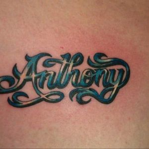 Above my R breast this is my husband's name he designed it . It was done at Voodoo Tattoos in Port Allegany PA