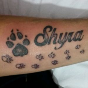 Paws and name. #tattoo #pawdog #leteringtattoo #shade #blackink