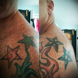 Capping my shoulder are four stars. My brother, my two sisters and I all designed one star each. All 4 of us have the same tattoo.