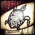 My first. Took my whole calf. I'm superstitious, especially when it comes to my family. Turtles have the same meaning in Chinese as it foes with a #polynesian tattoo. Except the polynesians look better. I asked for a lot of things to be added, the shield, shark teeth, the goat head at the bottom as well as my Chinese Zodiac. Done at Haunted Tattoo in London. Sorry I forgot the artist. It was a very tall and big Italian guy!