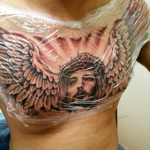 Freehand freestyle religious tattoo