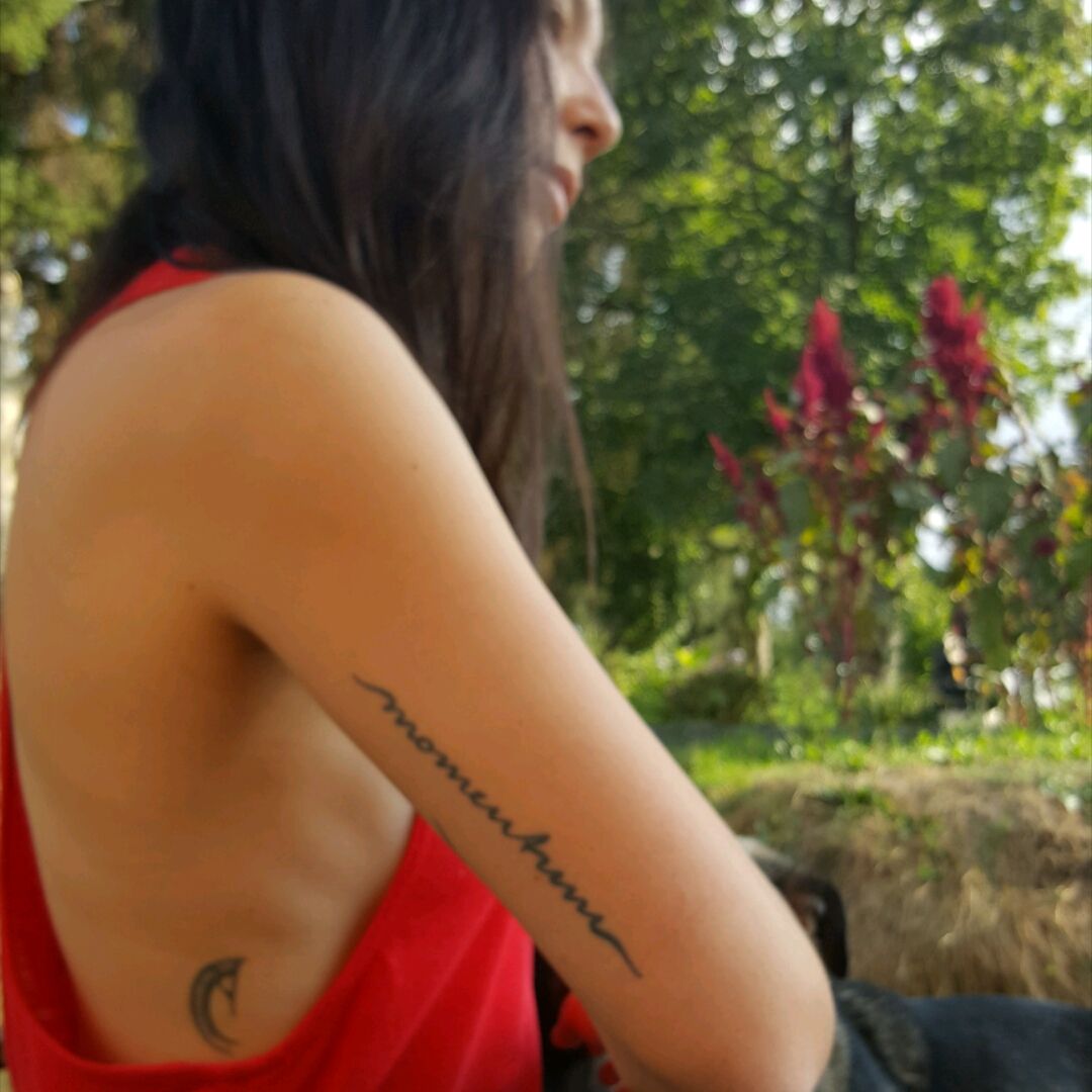 Tattoo uploaded by Sabrina Nyuki • This momentum tattoo is 2 years
