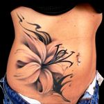 I want something like this on my left ribcage with the sheet music of Chopins "Raindrops" incorporated in to it. The Lily is for my daughter, the music is dear to my soul!  #megandreamtattoo #meganamassacredreamtattoo