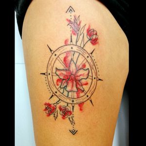 Rudder and flowers, familiar tattoo