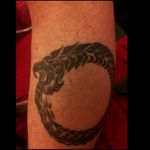 Oroborous- tail devourer in Greek. Ancient symbol of the cycles in the universe. Over 4000 years old. (The design, not my leg)