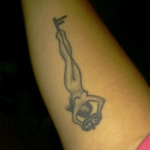 My forearm tattoo of a key and a woman. The meaning behind it is "Unlocking my inner goddess"