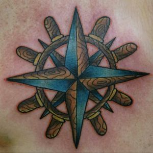 Compass steering wheel tattoo by Sam Ramsey