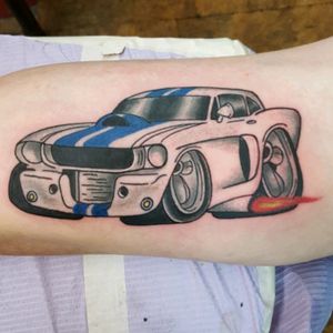Mustang tattoo by Sam Ramsey