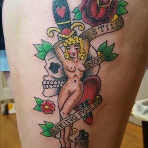 Traditional pin-up tattoo by Sam Ramsey