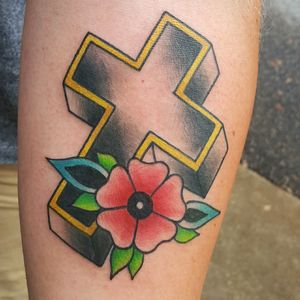 Traditional cross tattoo by Sam Ramsey