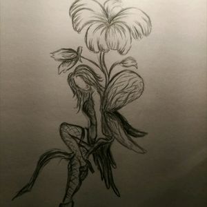 I have been drawing on this design like forever. I really suck. And cant even sketch the tattoo i want. I need serious help from a pro that I belive can make my dreamtattoo come to life. Dearest Megan. Please help me with this pinup fairy with lillies. And make it go colours  😘 #MEGANDREAMATTOO