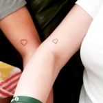 My best friend and I got matching hearts, inspired by the song "carrying your love with me", representing our support for one another no matter how far away we are.
