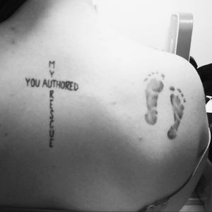 The cross in the middle of my back is made out of the lyrics "you authored my rescue" from the song My life is an offering by Sovereign Grace music Note: it looks a tad crooked because of my shoulder positioning.