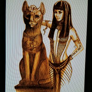 Egyptian memorial tatt but can't get the right design yet. Cat or Cats with Queen