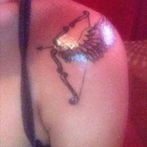Tattoo uploaded by Ingrid Schirmer • #blackwork #arrow #bow #shoulder  #wings #cupid #shaded #brazil #brasil #arco #flecha #cupido • Tattoodo