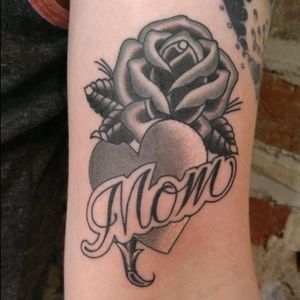 Done by Justin Dunwoody at Eastern Pass Tattoo Co. #mom #momtattoo #blackandgrey #rose