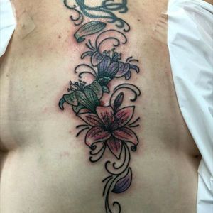 #lovehatetattoos #miamiink #lillies I had the middle piece added when I visited Miami.. tried to get Ami James to do it. But unfortunately wasn't in town at the time of my trip. Love this all the same .