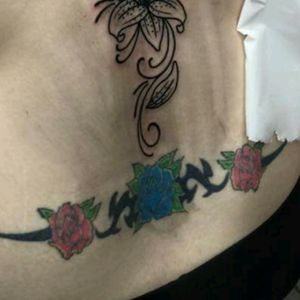 My first piece of ink.. started with the blue rose and then went back to add the red roses to it. #roses