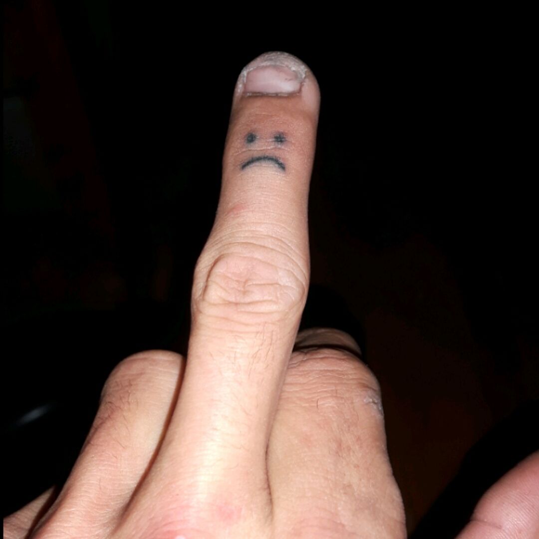 Tattoo Uploaded By Chris Wynn • Felt Like I Needed A Sad Face On My Middle  Finger... Getting A Happy Face On My Other One Soon :) First Tattoo I Did On