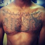 Gates of heaven chest piece that says at the top "Only After Walking Through Hell Will I See The Gates Of Heaven"