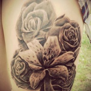 Tattoo on my right thigh #thightats  #flowers #roses #tigerlilly #realism