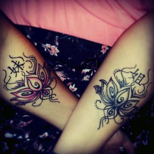 Mine is the left one, my sister's is the right one. Our bond is so strong that we even made it stronger with a lotusflower tattoo and chinese signs for little and big sister #lotus #lotusflower #chinese #sistattoos #sisters #color #black