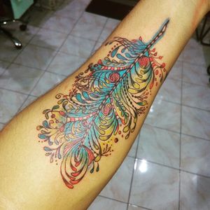 My newest Feather Tattoo.. 😉