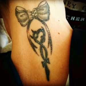 #bowtattoo (used to be pink) #bow #symbol #meaning #lovelifeandloyalty I like the bow but the symbol I don't like the look of, needs improving