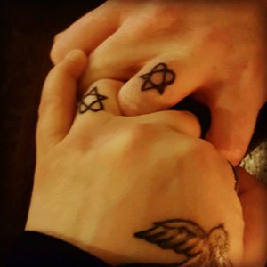 His and hers Heartagram ring finger tattoos @craigthebeard  #tattooedcouple #heartagram #heartagramtattoo