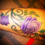 Rosé Vine wraps up whole leg, up body side over shoulder and then down my arm...done by Michael Cameron