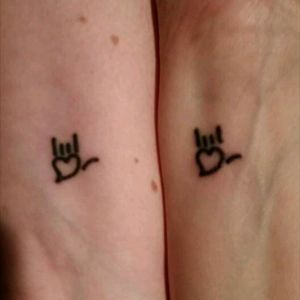 Matching tattoos me and my mom got on 4/4/16 at Old Soul Tattoo by Ivan Soyars. American Sign Language meaning I Love You #iloveyou #americansignlanguage #signlanguagetattoo #signlanguage #matchingink #matchingtattoos
