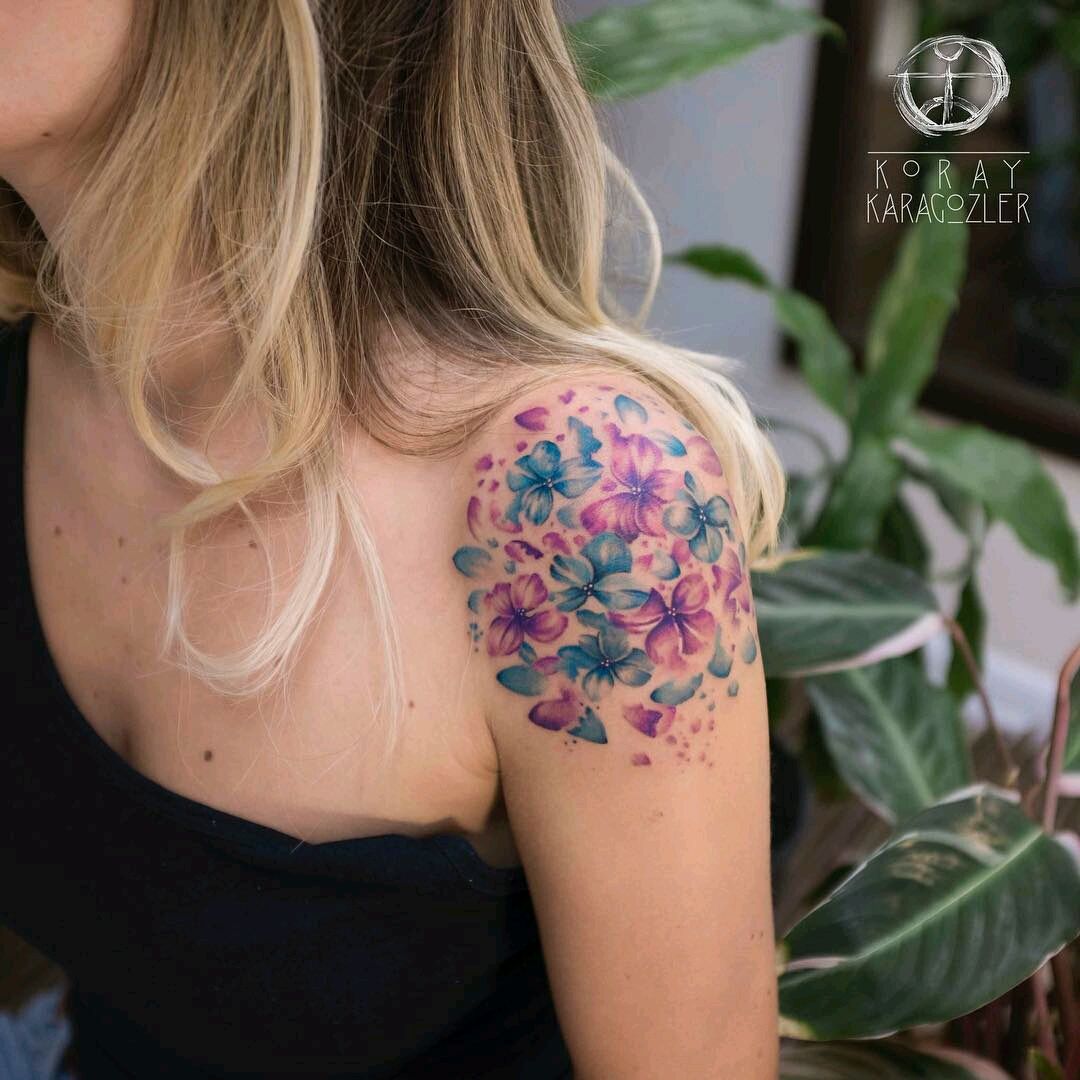 Watercolor hydrangea tattoo on the ankle