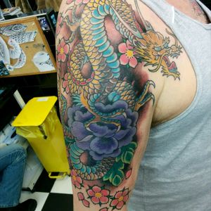 By Steve @ Skunx Tattoo London UK#skunx #skunxtattoo #irezumi #japanesedragon #sakura #dragon #peony