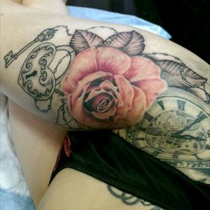 Progress of my side piece, 4th session, adding leaves to the roses by Daniel from Nine Lives Tattoo Studio (my 10th tattoo)  #Sidepiece #thigh #sidebody #realistic #rose #watch #padlock #key #hip