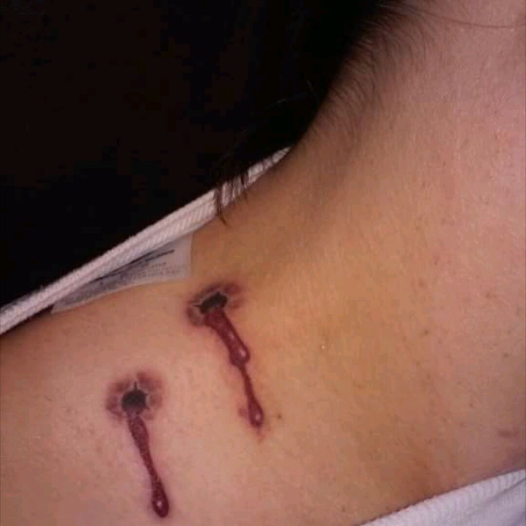 vampire bite marks tattoo