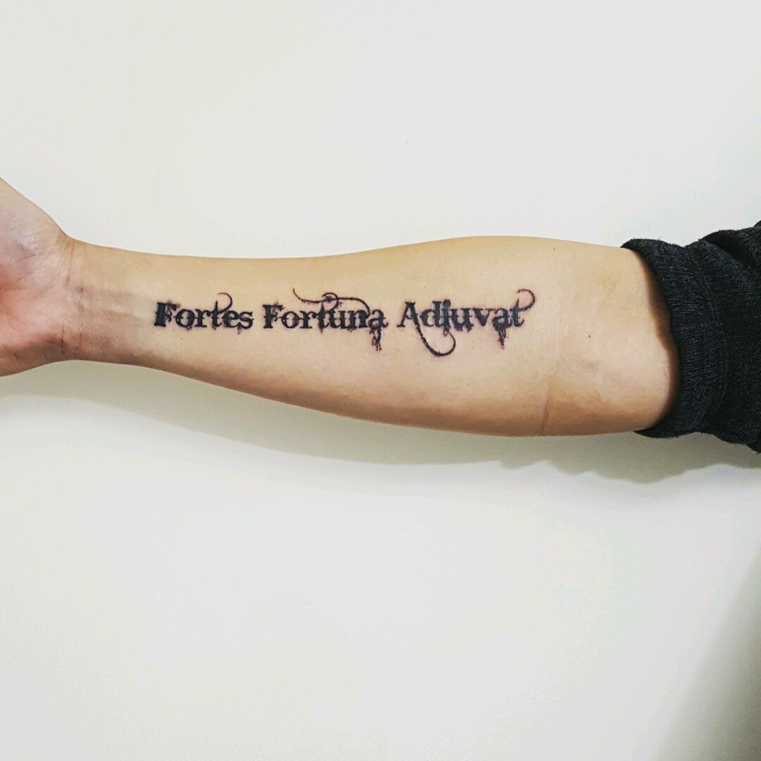 Fortune favours the bold lettering tattoo located on