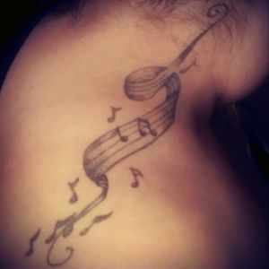 Love this tattoo represents my love for music