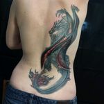 Clutching dragon tattoo by Jim @ Audacious Ink #dragon #winged #woman #womenwithtattoos #fantasy #coverups