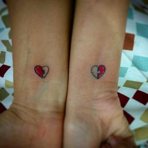 couple heart puzzle tattoo