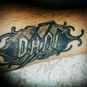 Left under arm, my daughter's name. AC/DC style lettering.