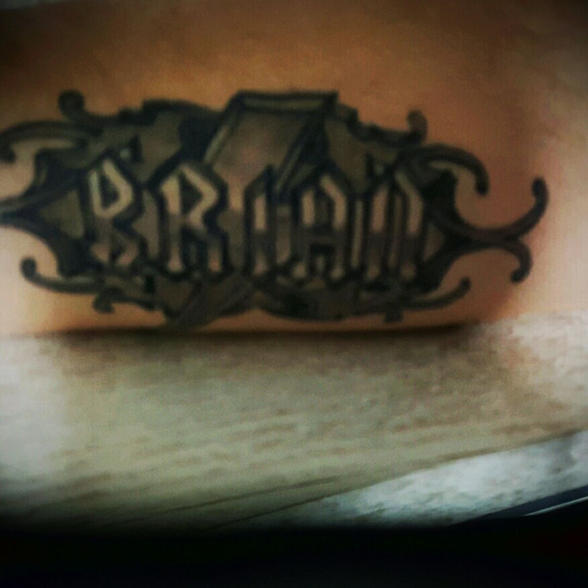 Tattoo uploaded by Marc • My son's name. Print is from a AC/DC sticker ...