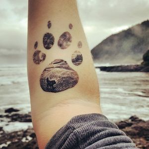 My dog's pawprint with an Oregon coast scene inside...