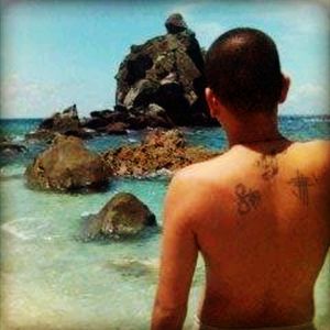 My first tattoos way back in the young wild and free days. Back then, it was with a makeshift glue gun. #symbolism is my love for ink. Apo Island, Philippines 2005