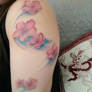 We added more cherry blossoms up my arm. I think I'm going to continue down my forearm. Not sure yet though...#cherryblossom #sakuraflowers  #cherryblossomflowers #dragonflytattoo  #dragonagetattoos #dragonfly