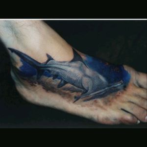Wanting a shark tattoo haven't decided where or if it'll be a hammer head.  Liked this idea though