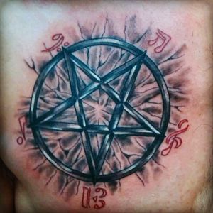 This is an inverted pentagram made by a friend of mine, Taryo, in his old tattoo shop about 3 years ago. I love esoteric and satanic symbols and his meanings. The symbols around it are made because I love music. I love this tattoo and I'm proud that a friend of mine made it.#pentacle #pentagram #inverted #colour #blackandred #esoteric #esoterism #occultism #satanismo #music #taryo #taryo tattoo #pisa