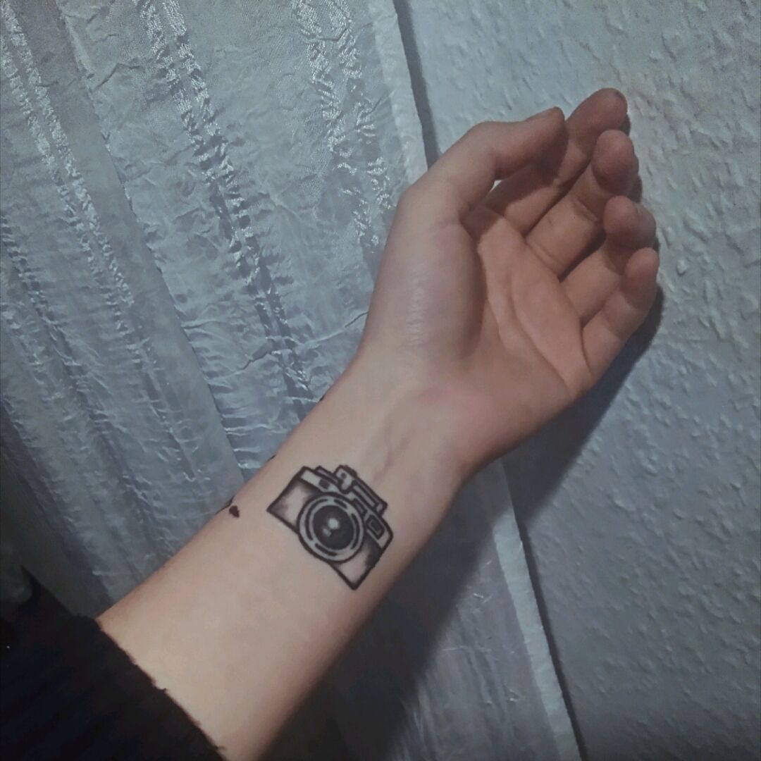 Lush Tattoo Club  Camera tattoo on hand  cameratattoo handtattoo  blackandwhite realistic smalltattoo passionate  Facebook