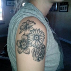 I don't have any recent pictures of this one but each flower is one of my family members flowers that goes with the month they were born. I need to still add my grandparents. Not completely finished.